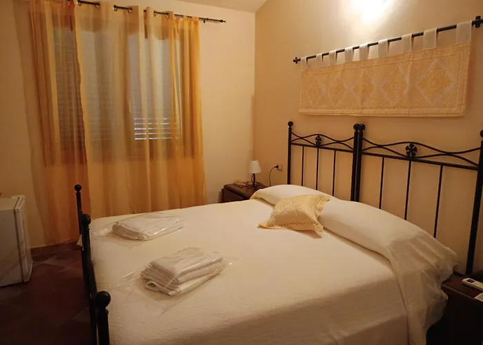 Donna Violante Porto Corallo Affittacamere