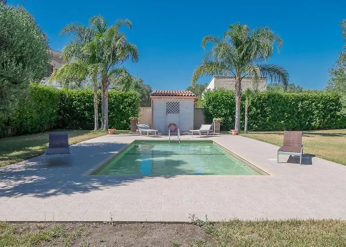 Villa IslaMaris con Piscina nel Boomerang Village a Torre Colimena